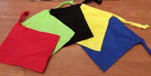 5 small coloured drawstring bags for Ticket to Ride trains